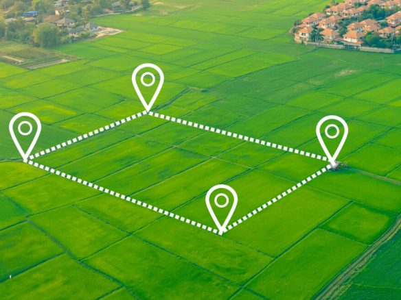 Property developer assessing development land in the UK before making an offer.